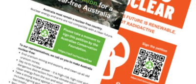 Poster with "No Nukes" text, mushroom cloud graphic, and peace symbol.