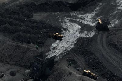 Coal mine landscape, Leard, with machinery and open pit.