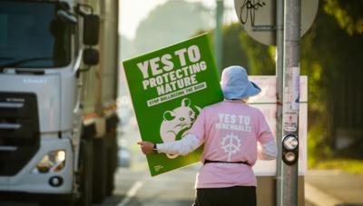 A vibrant graphic with text and shapes, likely a design or poster.