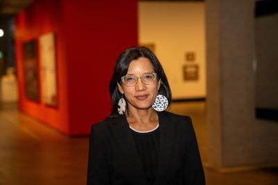 Woman, Christine Anderson, smiling, headshot, blonde hair, professional attire.