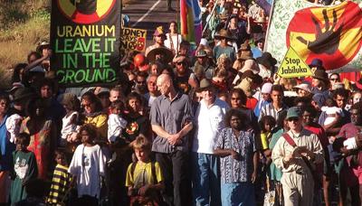 Header image: Green landscape, text "Post Win Jabiluka" with a blurred background.