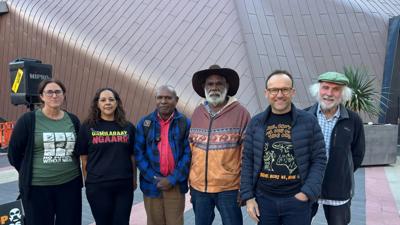 Speakers at Santos AGM rally