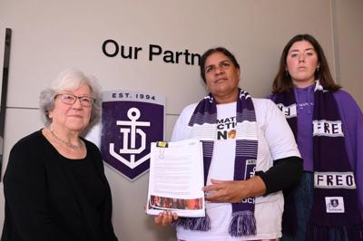 Header image: Woodside petition, text on a green background, people, signatures.