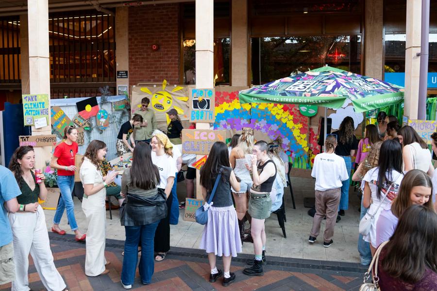 The ACF climate action hub with sign-making, eco-glitter and photo booth stations