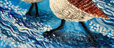 Sandpipers on a beach, shallow water, sand, sky.