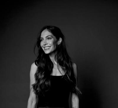 Woman, Natalie Kyriacou, smiling, headshot, professional, outdoors, daytime.