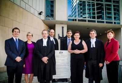 Header image: Carmichael court case, text overlay, Australian flag, courtroom sketch.