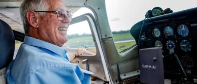 Gladstone harbor view, industrial landscape, ships, cranes, and water.